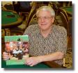 Ron Rose, here showing his book Poker Aces